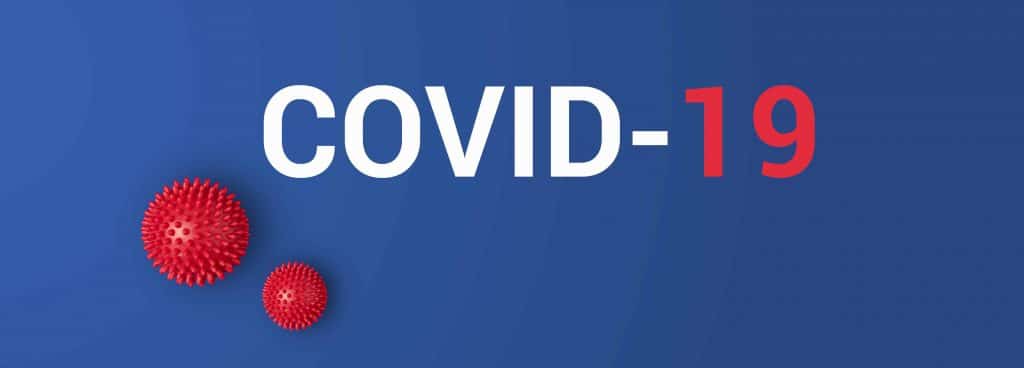 Iinscription COVID-19 on blue background with red ball